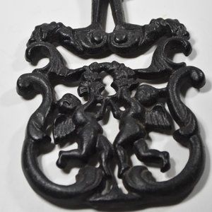 Vintage Cast Iron Cupid Trivet 1955 T-11